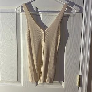 V neck top with tan buttons